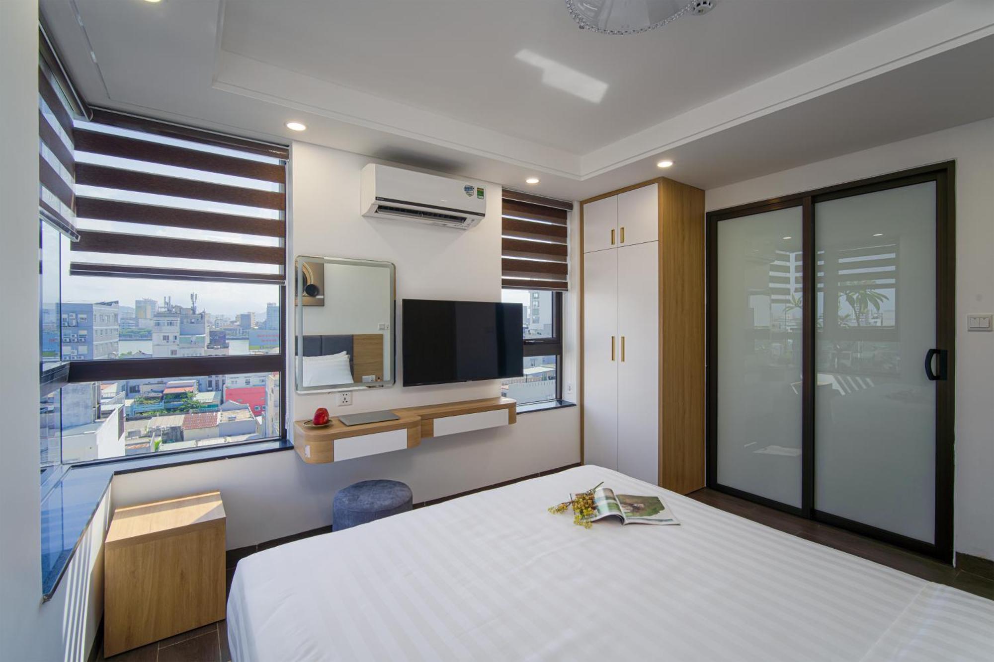 Hsuites Riverside Hotel And Apartment Da Nang Rum bild